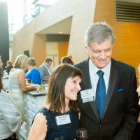 Group of guests chatting at Enrichment.